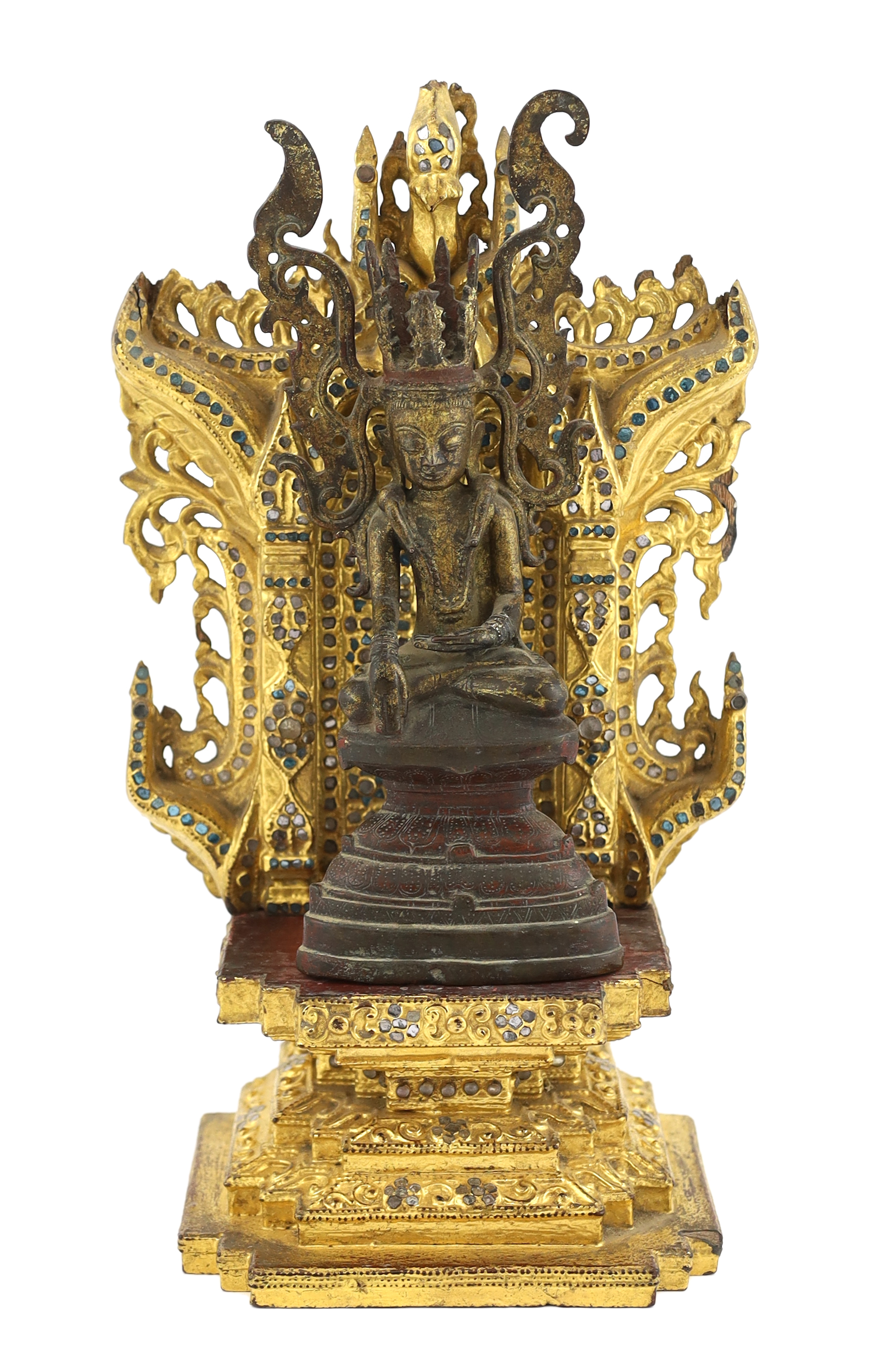 A Burmese gilt bronze seated figure of Jambupati Buddha on a throne, Shan, 17th-18th century, losses to headdress